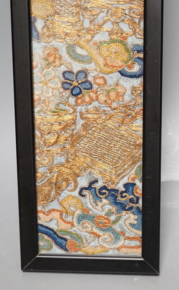 A Chinese framed embroidered floral panel - 53 x 8cm